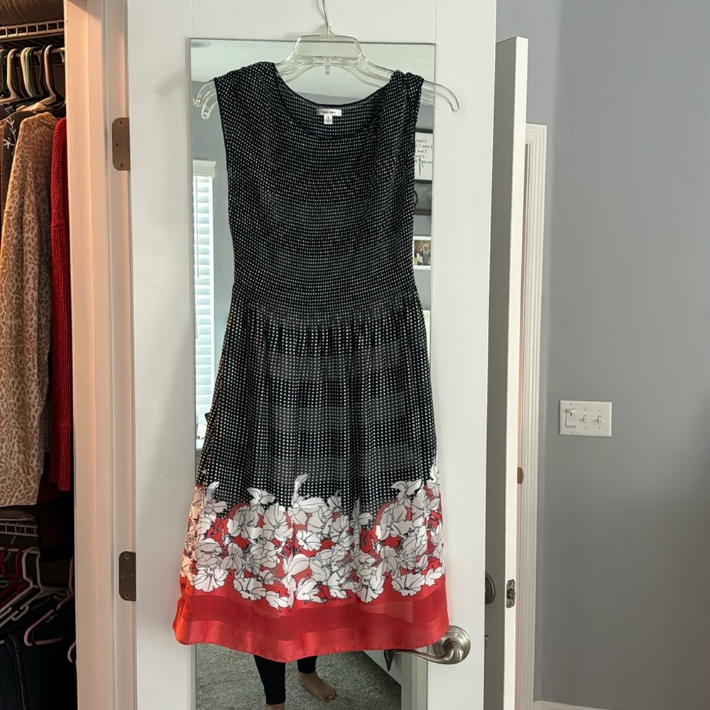 Knee length dress.